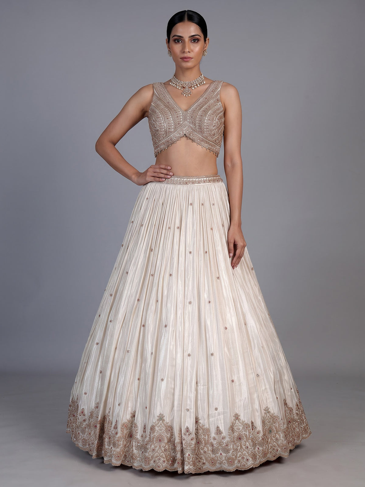 Cream silk embellished lehenga choli with elegant dupatta