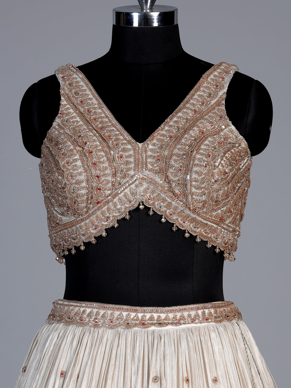 Cream silk embellished lehenga choli with elegant dupatta