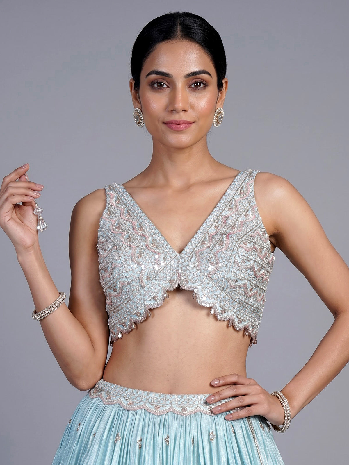 Sky blue tissue silk lehenga choli with exquisite embellished detailing