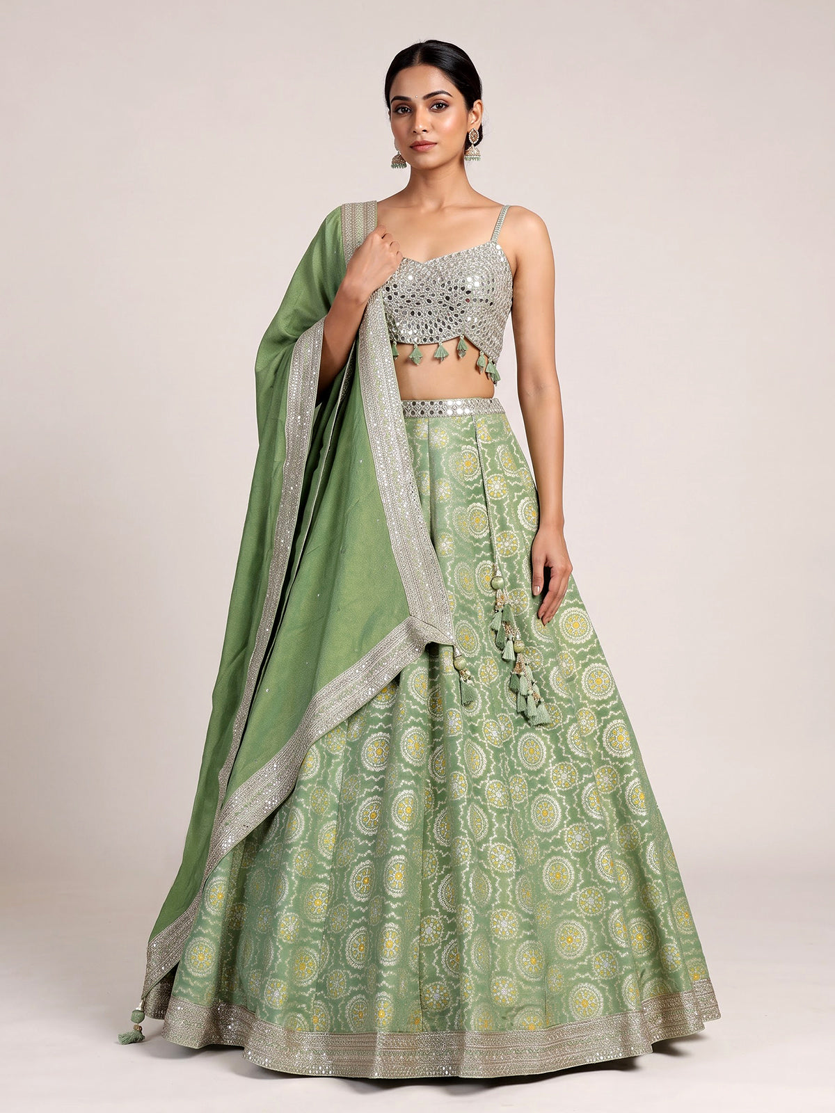 Pista green brocade silk lehenga choli with bandhani designer charm