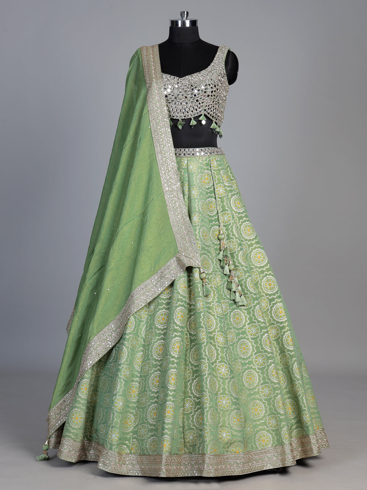 Pista green brocade silk lehenga choli with bandhani designer charm