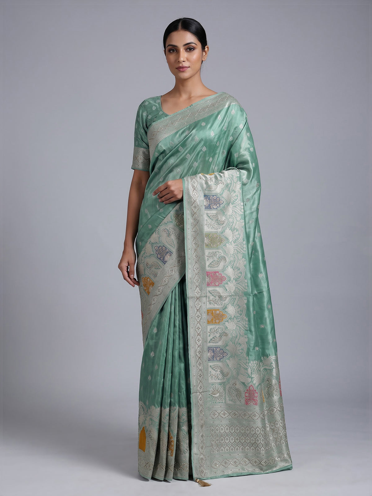 Mint blue silk saree with elegant peacock motif work
