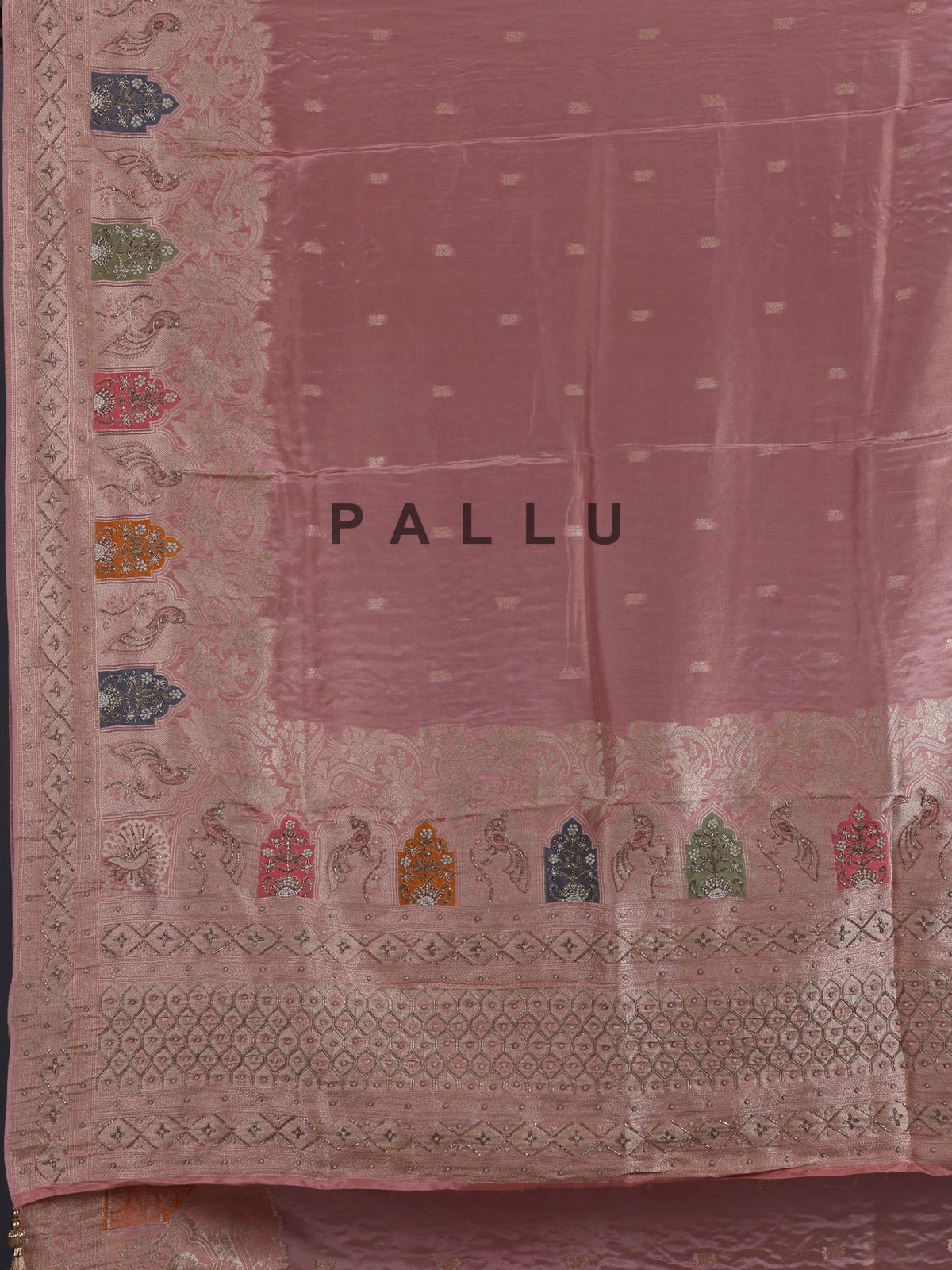 Pink silk saree with graceful peacock motif embellishments