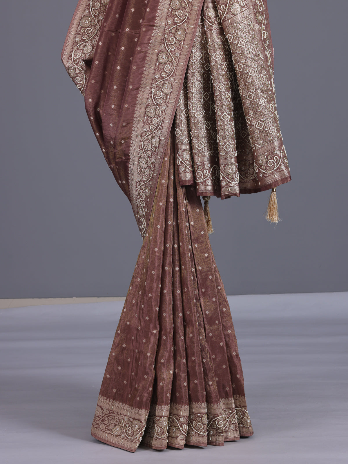 Chocolate brown silk saree with luxurious butti and tassels