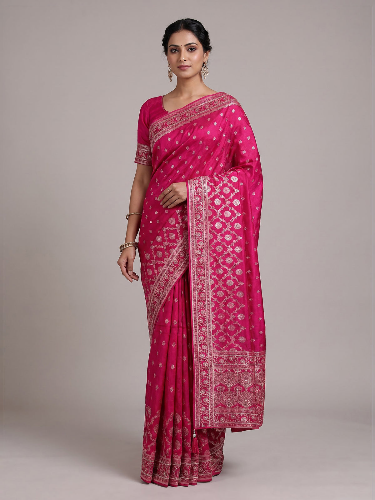 Rani pink silk saree with elegant butti work