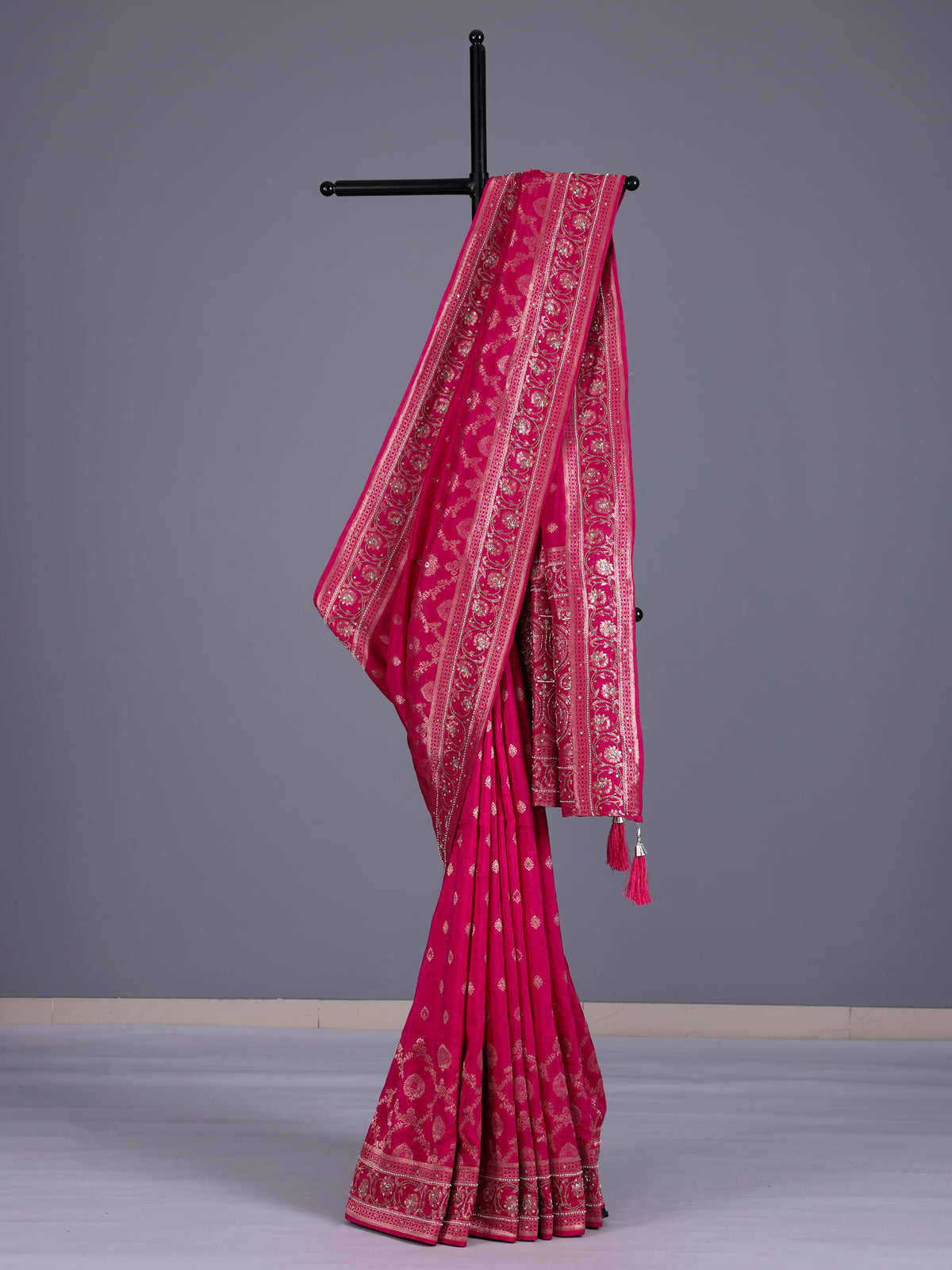 Rani pink silk saree with elegant butti work