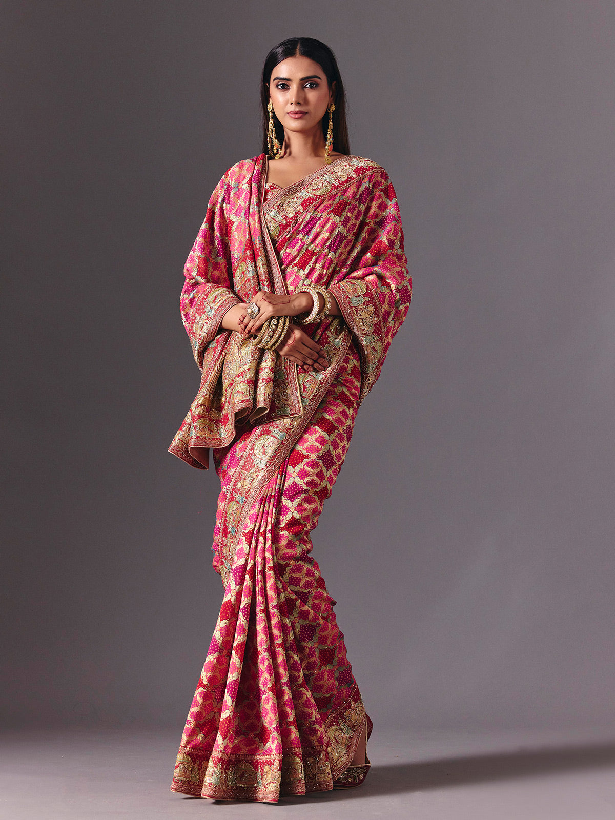Pink dola silk saree with doli barat bandhani detailing