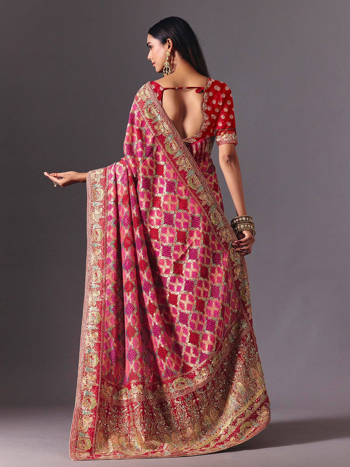 Pink dola silk saree with doli barat bandhani detailing