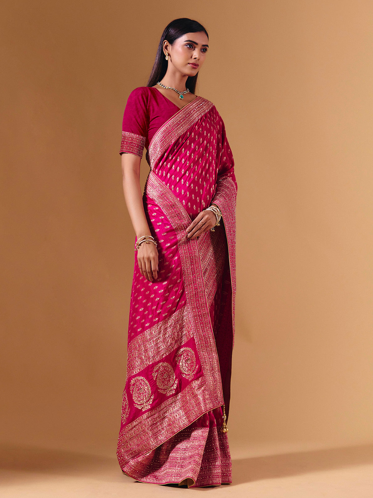 Rani pink dola silk saree with elegant zari butti work