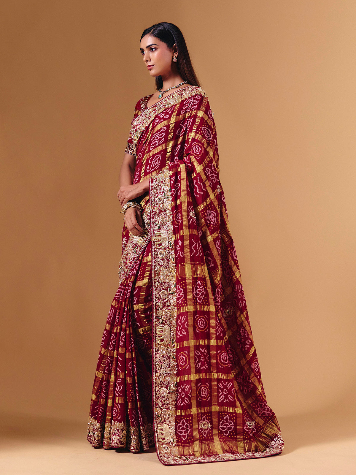 Maroon gharchola silk saree with elephant motif artistry