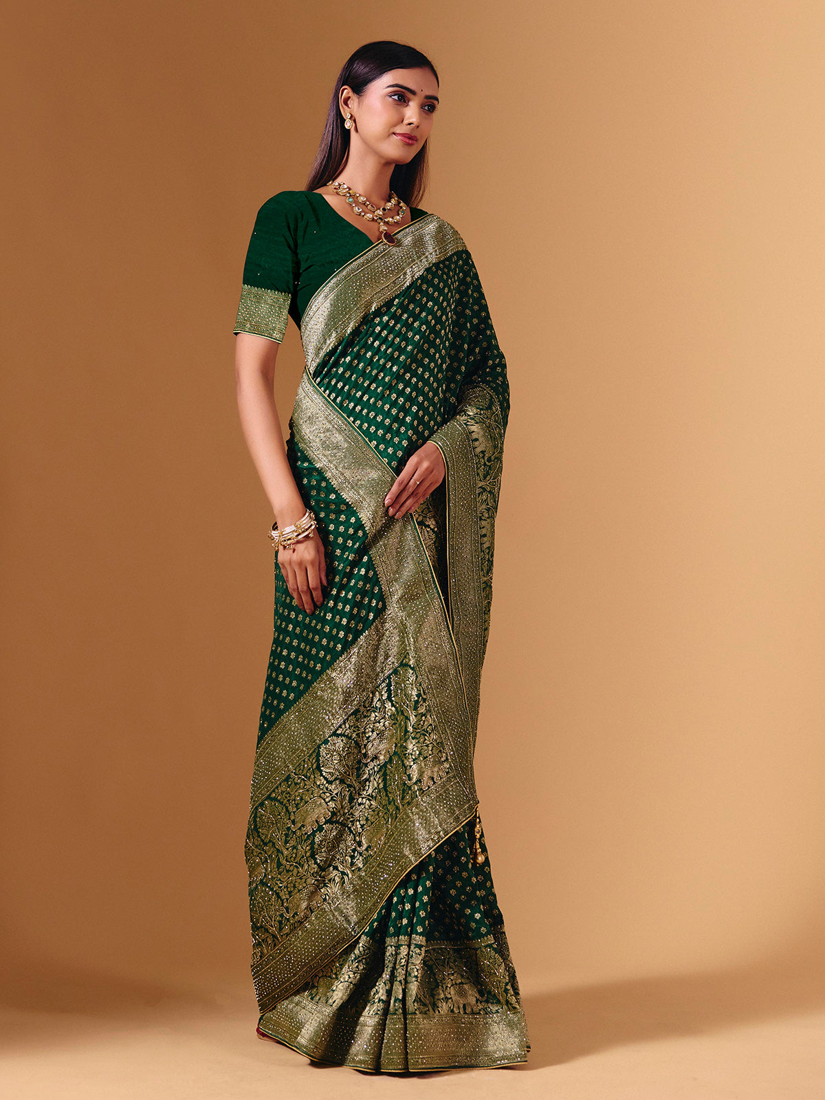 Green dola silk saree with elephant motif festive elegance