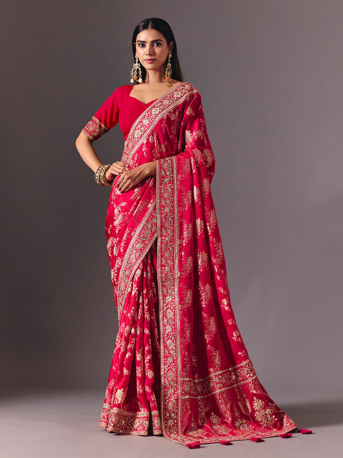 Rani pink satin silk saree with luxurious zari embellishments