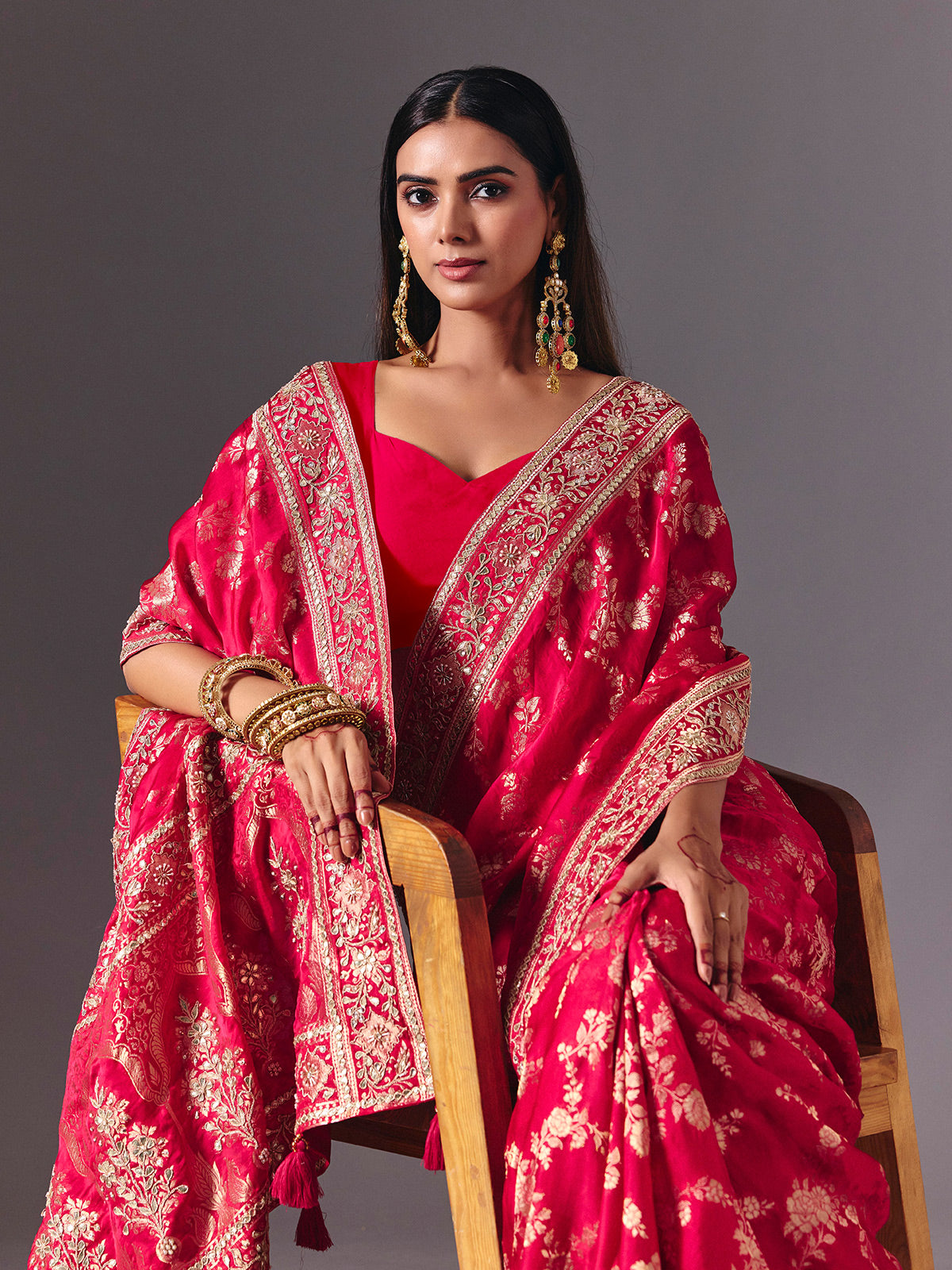 Rani pink satin silk saree with luxurious zari embellishments