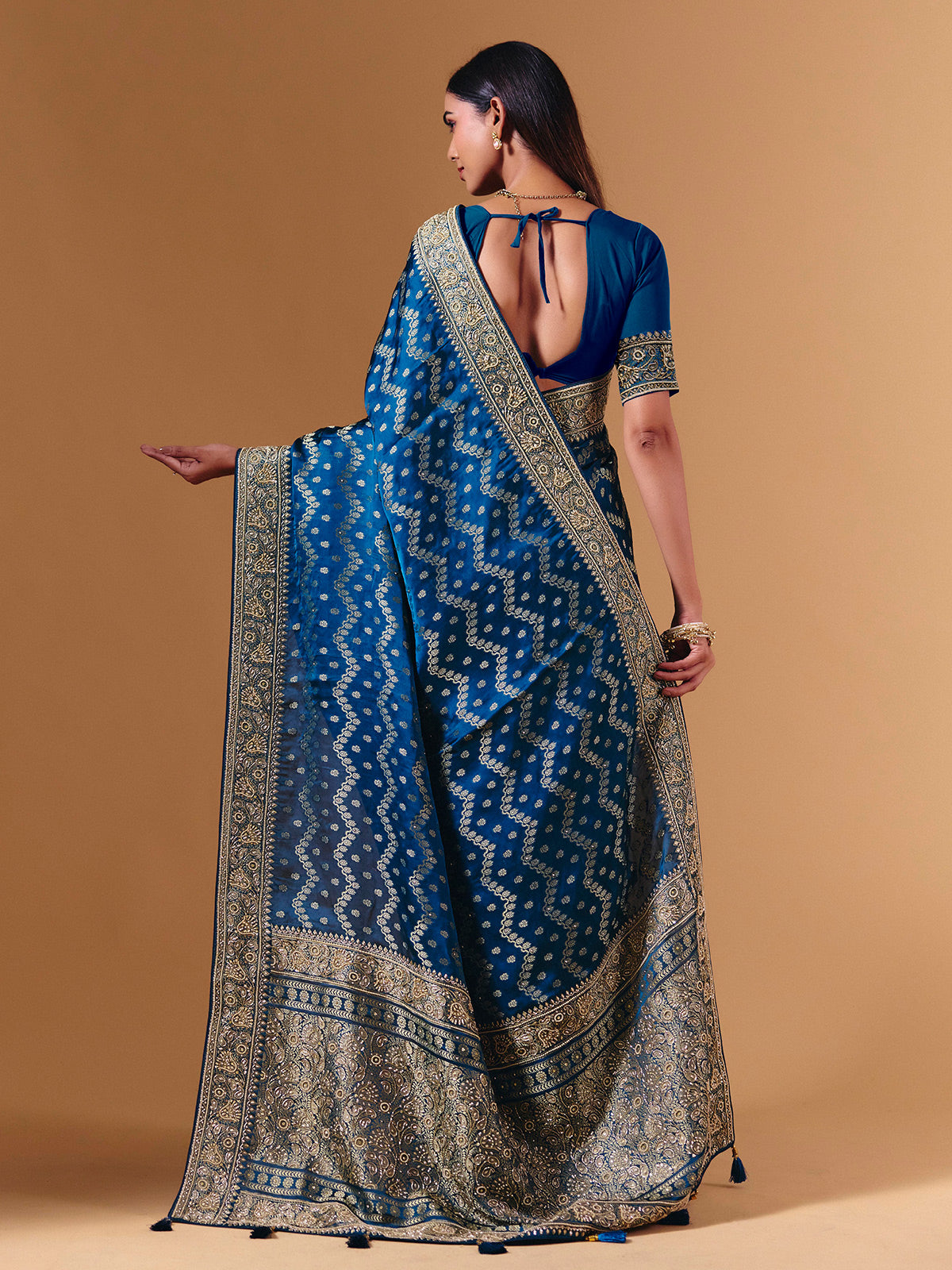 Royal blue modal silk saree with luxurious zari butti work