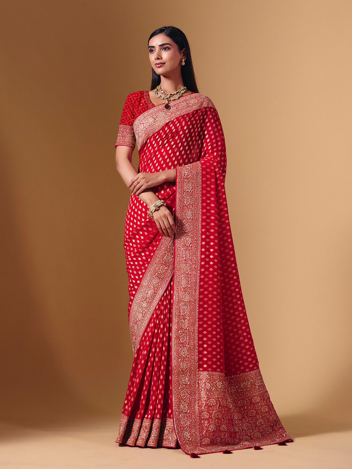 Red dola silk saree with exquisite zari butti embellishments