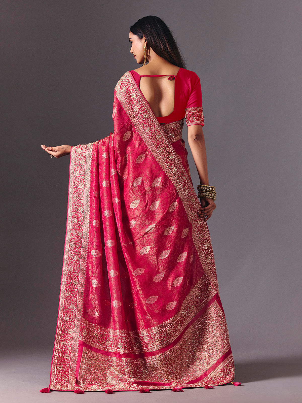 Rani pink satin silk saree with exquisite zari butta detailing