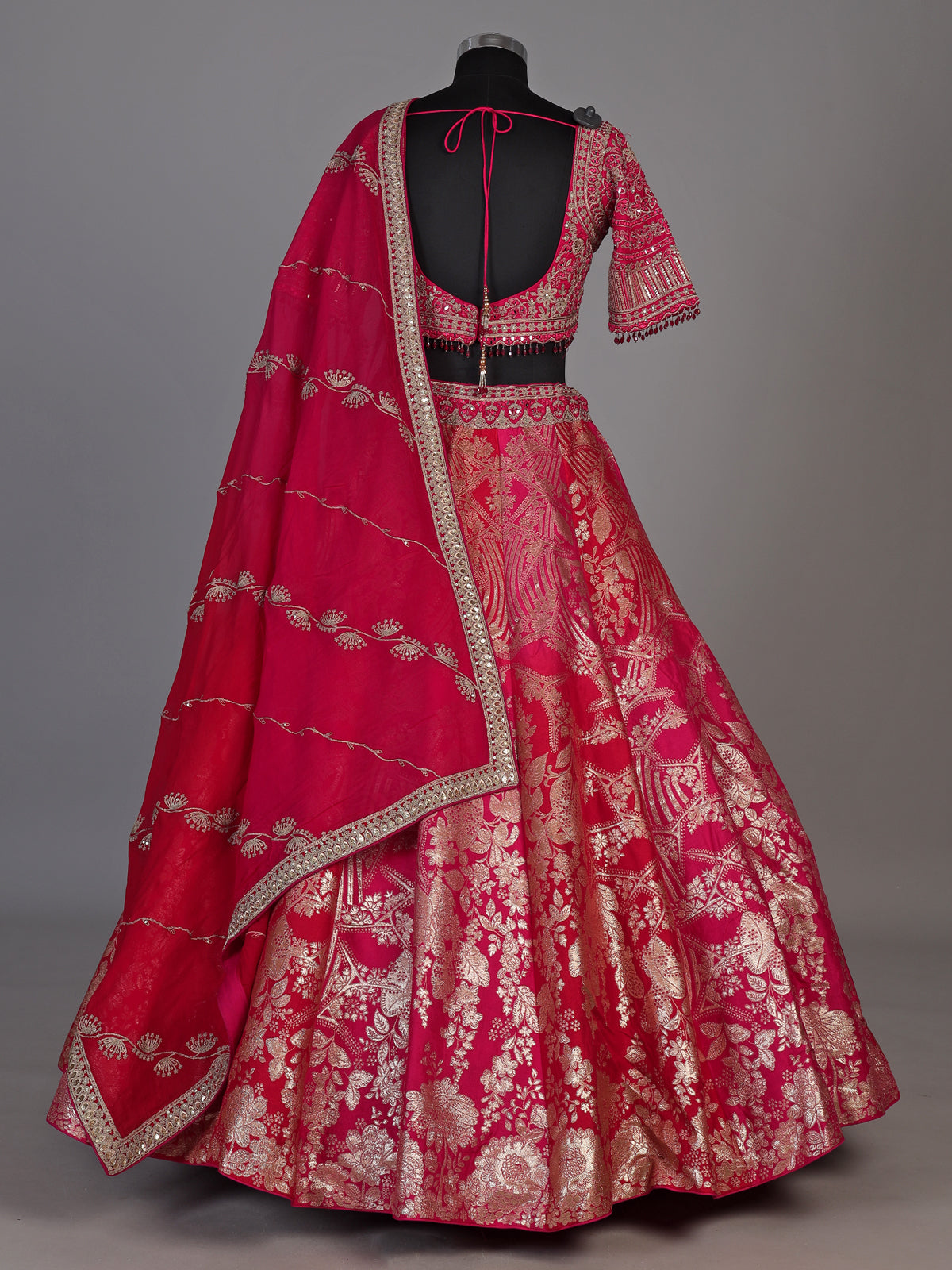 Rani pink banarasi jacquard lehenga choli with dupatta