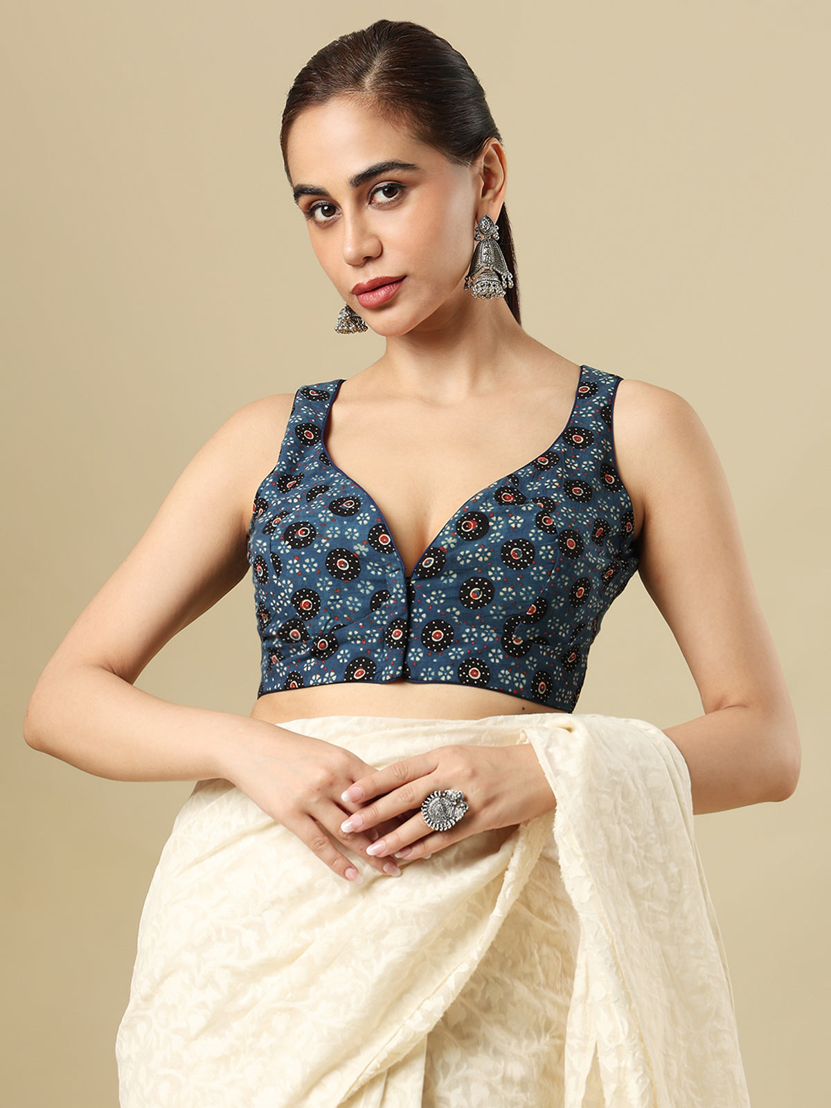 Blue cotton printed blouse with sweetheart neckline and front opening