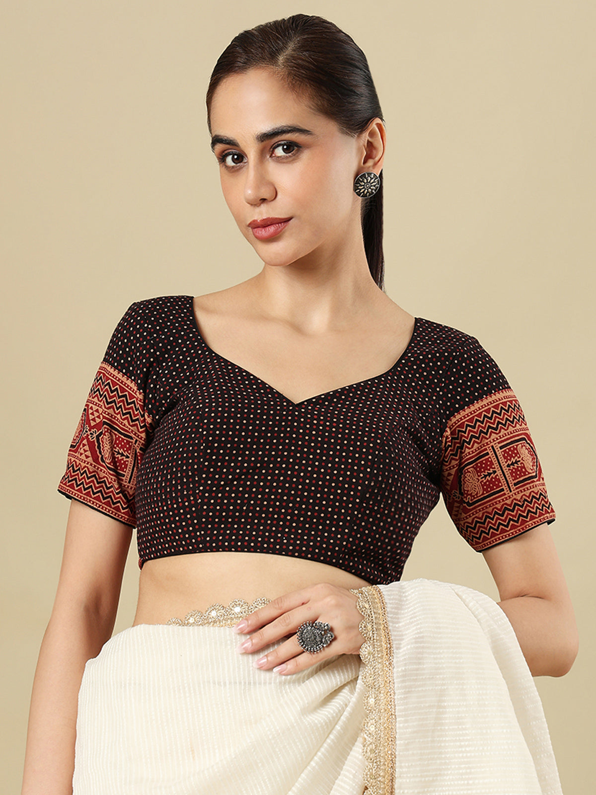Black cotton printed blouse with sweetheart neckline and half sleeves