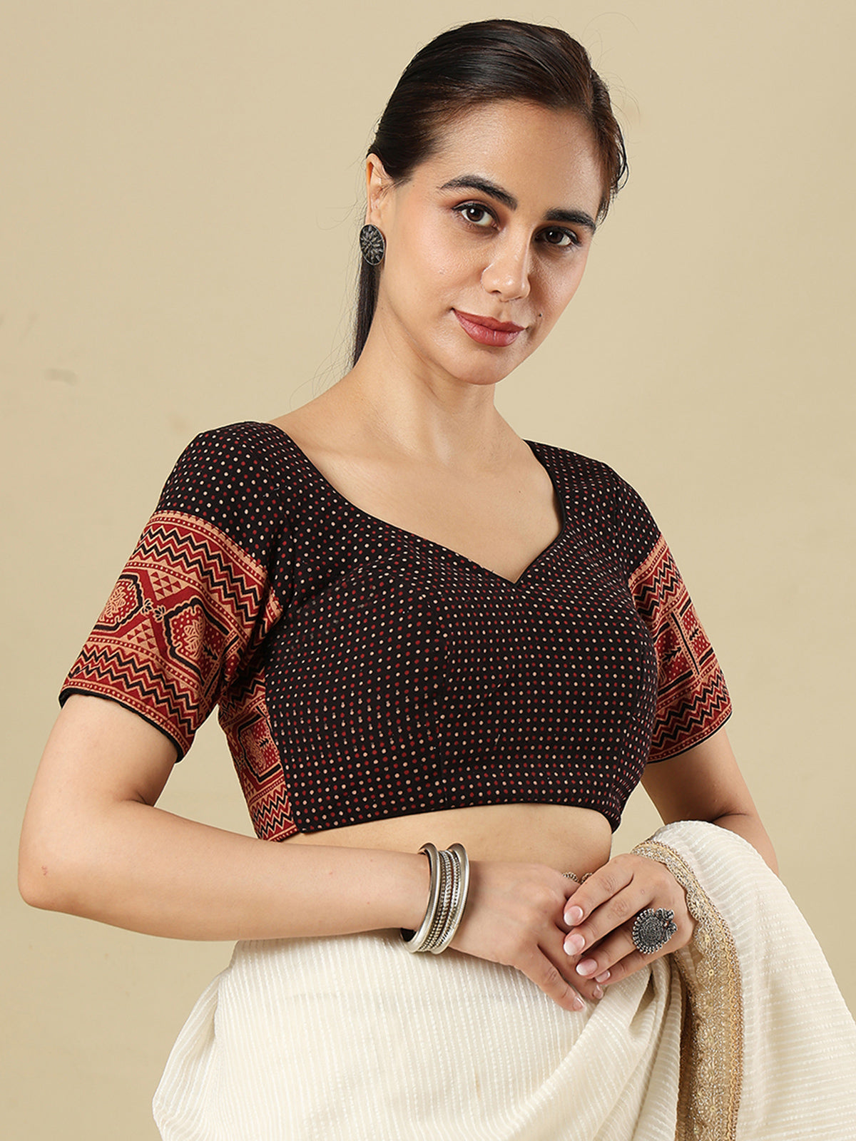 Black cotton printed blouse with sweetheart neckline and half sleeves