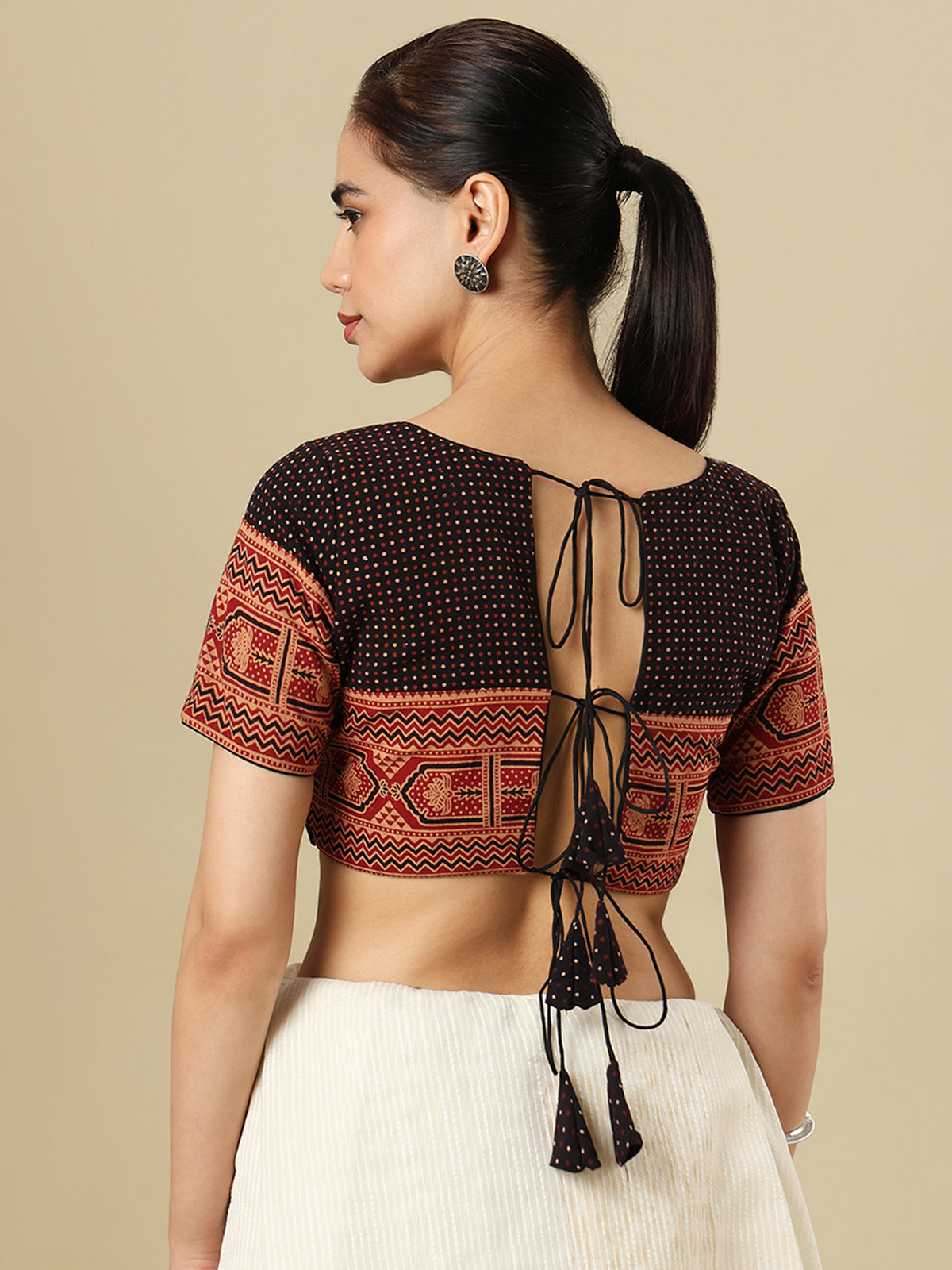 Black cotton printed blouse with sweetheart neckline and half sleeves