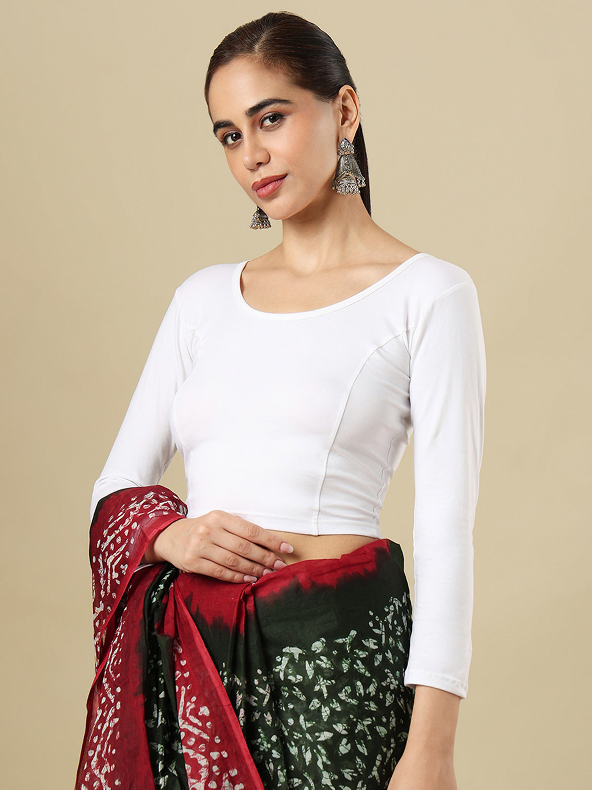 White cotton solid blouse with round neckline and quarter sleeves