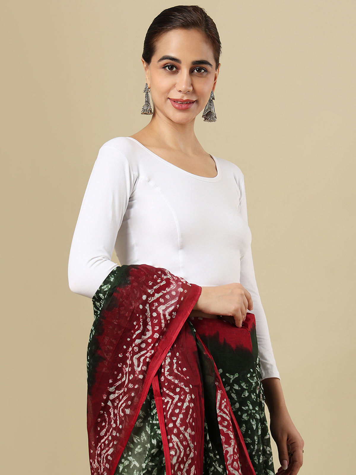 White cotton solid blouse with round neckline and quarter sleeves