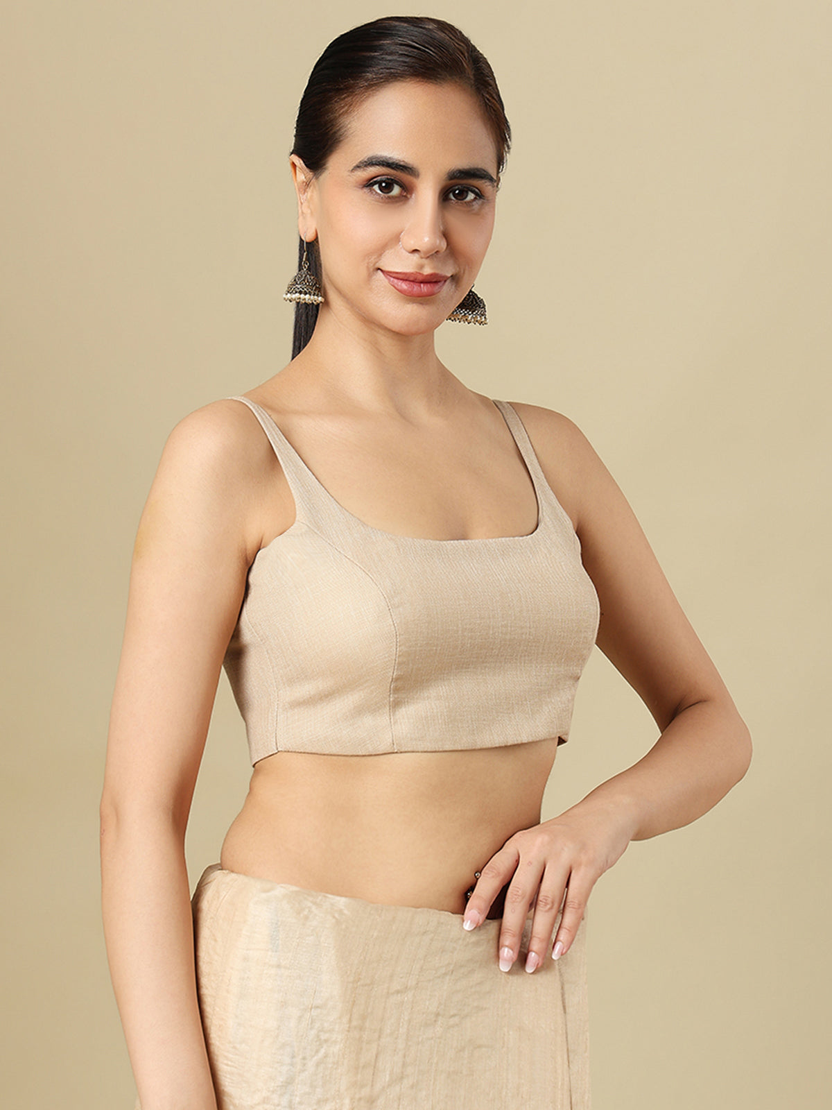 Beige linen solid blouse with round neckline and back opening