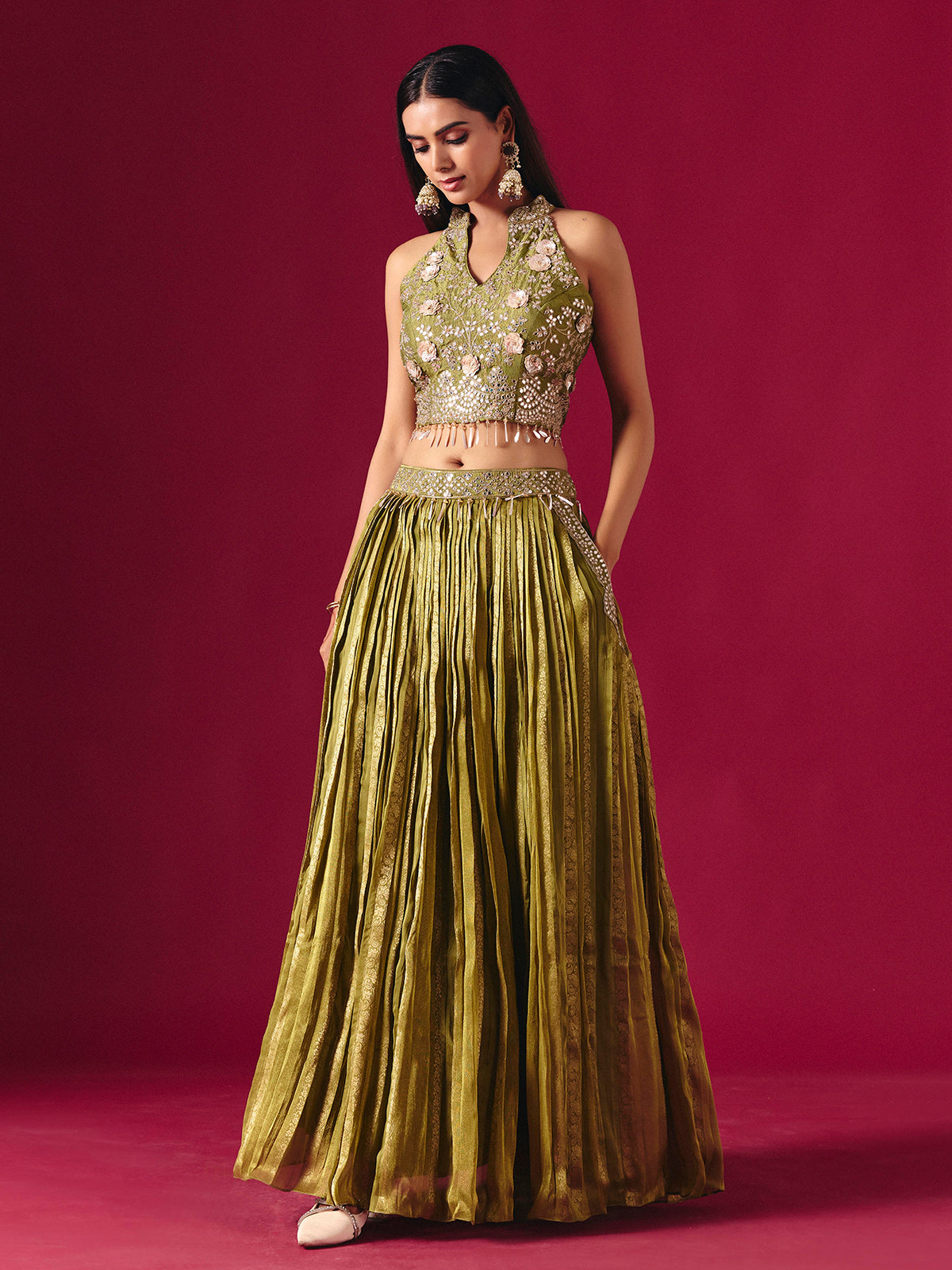 Olive green tissue silk lehenga choli with mirror and zari embellishments