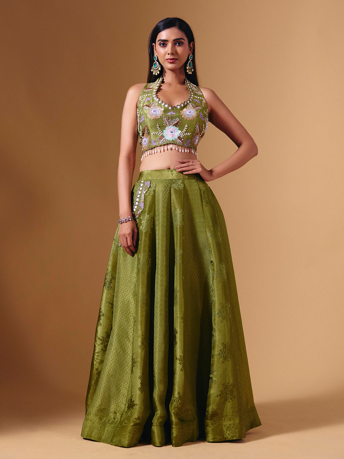 Green brocade silk lehenga choli with exquisite cutdana detailing