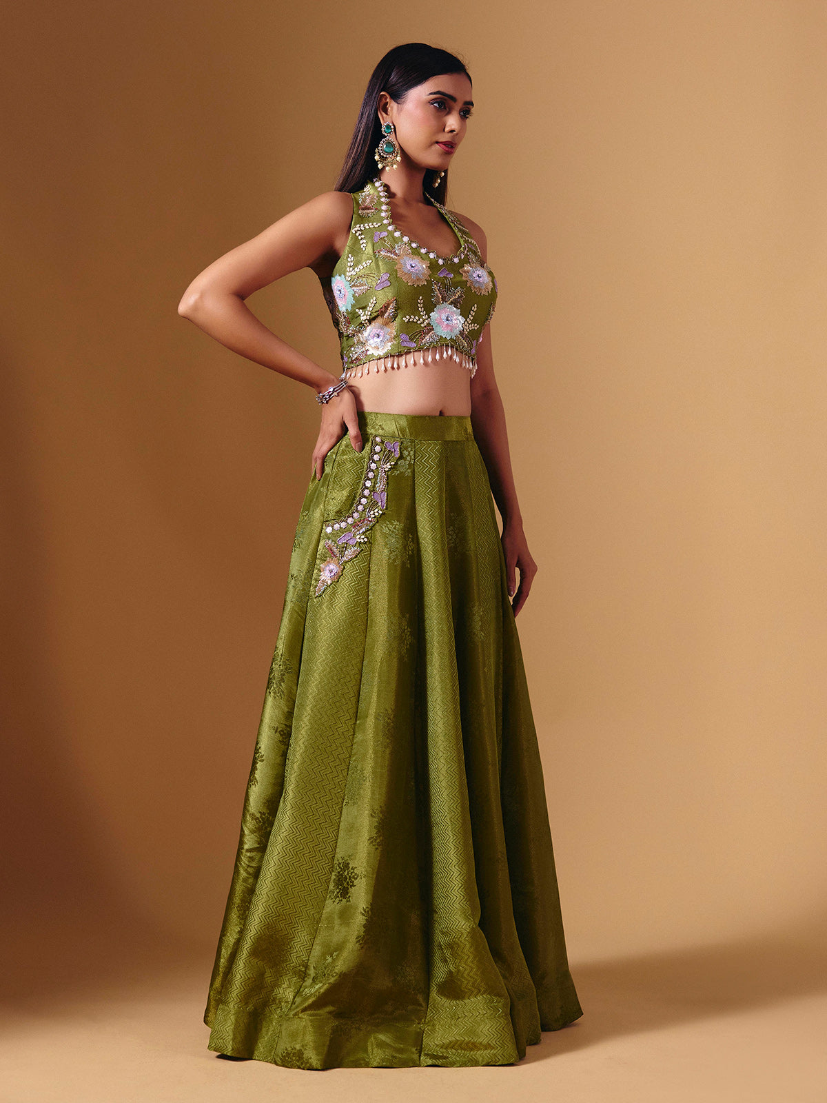 Green brocade silk lehenga choli with exquisite cutdana detailing