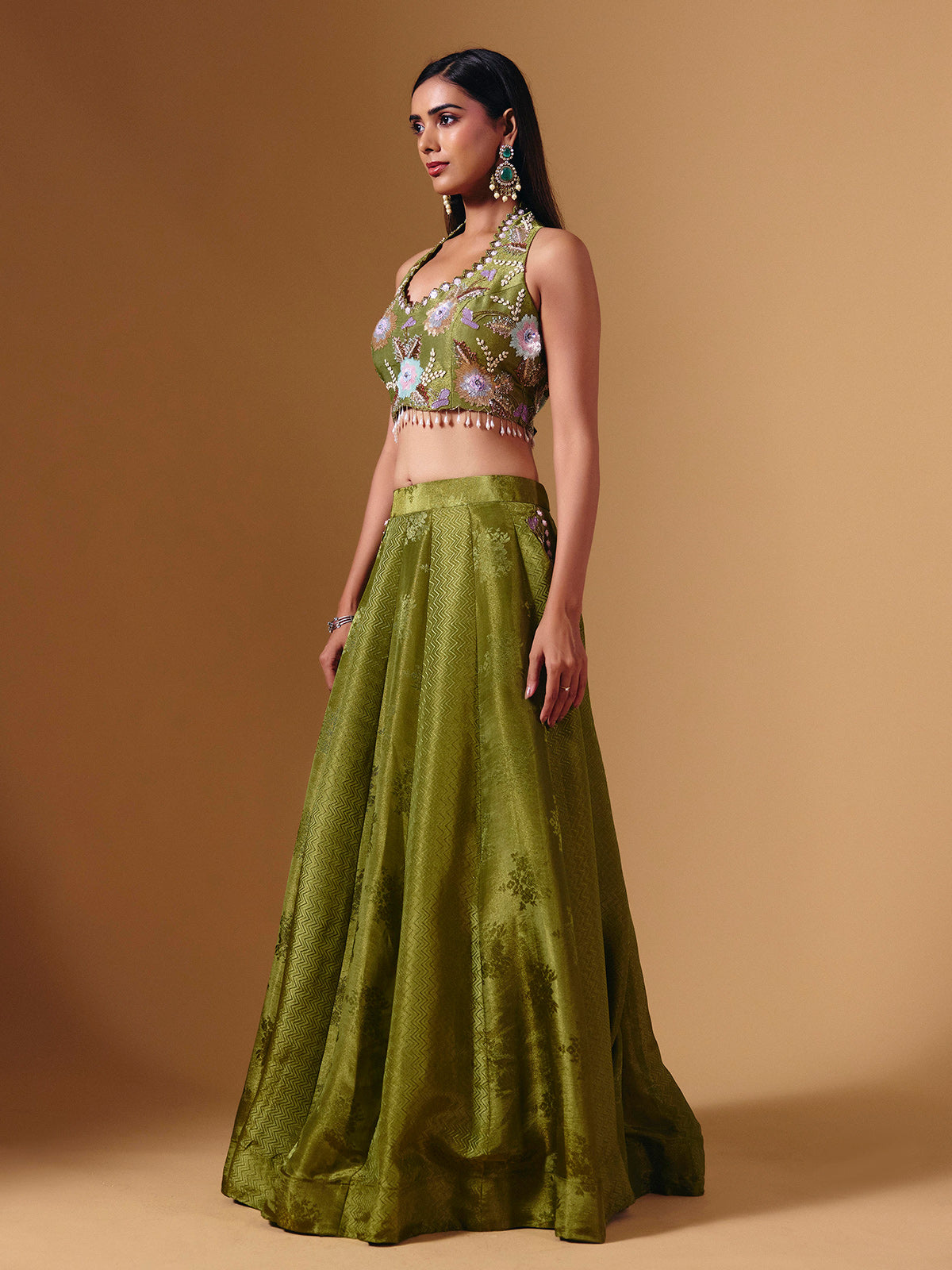 Green brocade silk lehenga choli with exquisite cutdana detailing