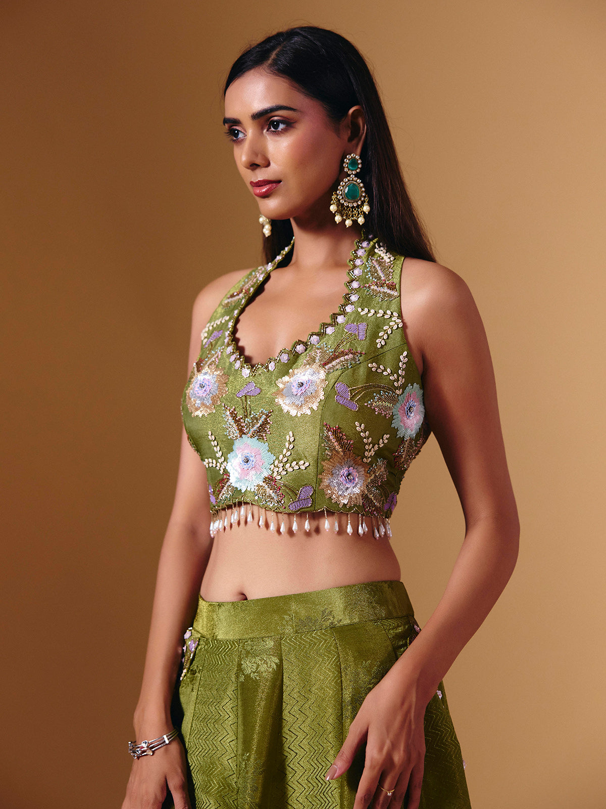 Green brocade silk lehenga choli with exquisite cutdana detailing