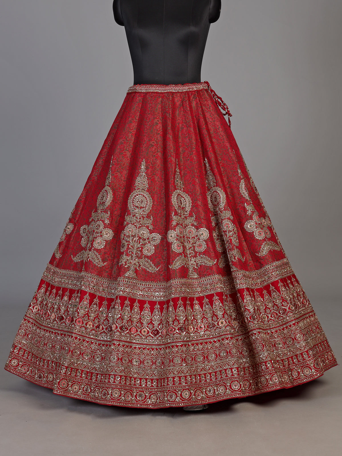 Red silk blend unstitched lehenga choli with pearl embellishments