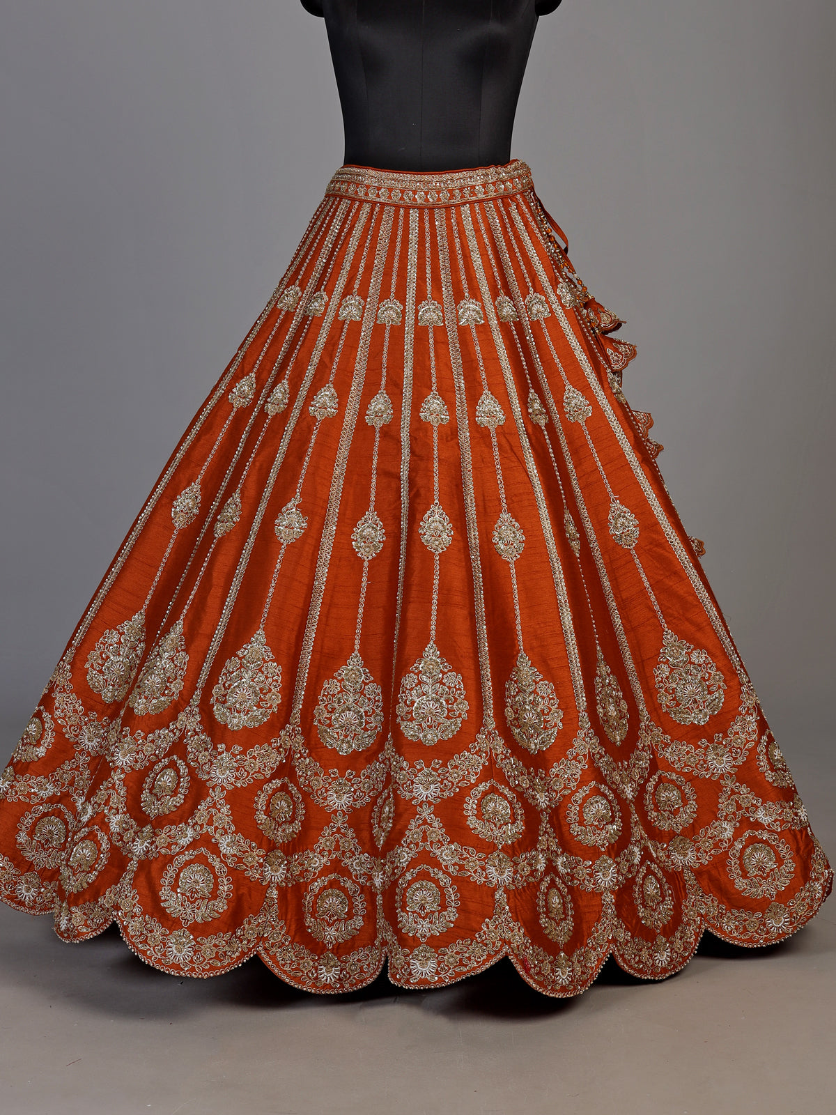 Rust orange raw silk unstitched lehenga choli with pearl accents