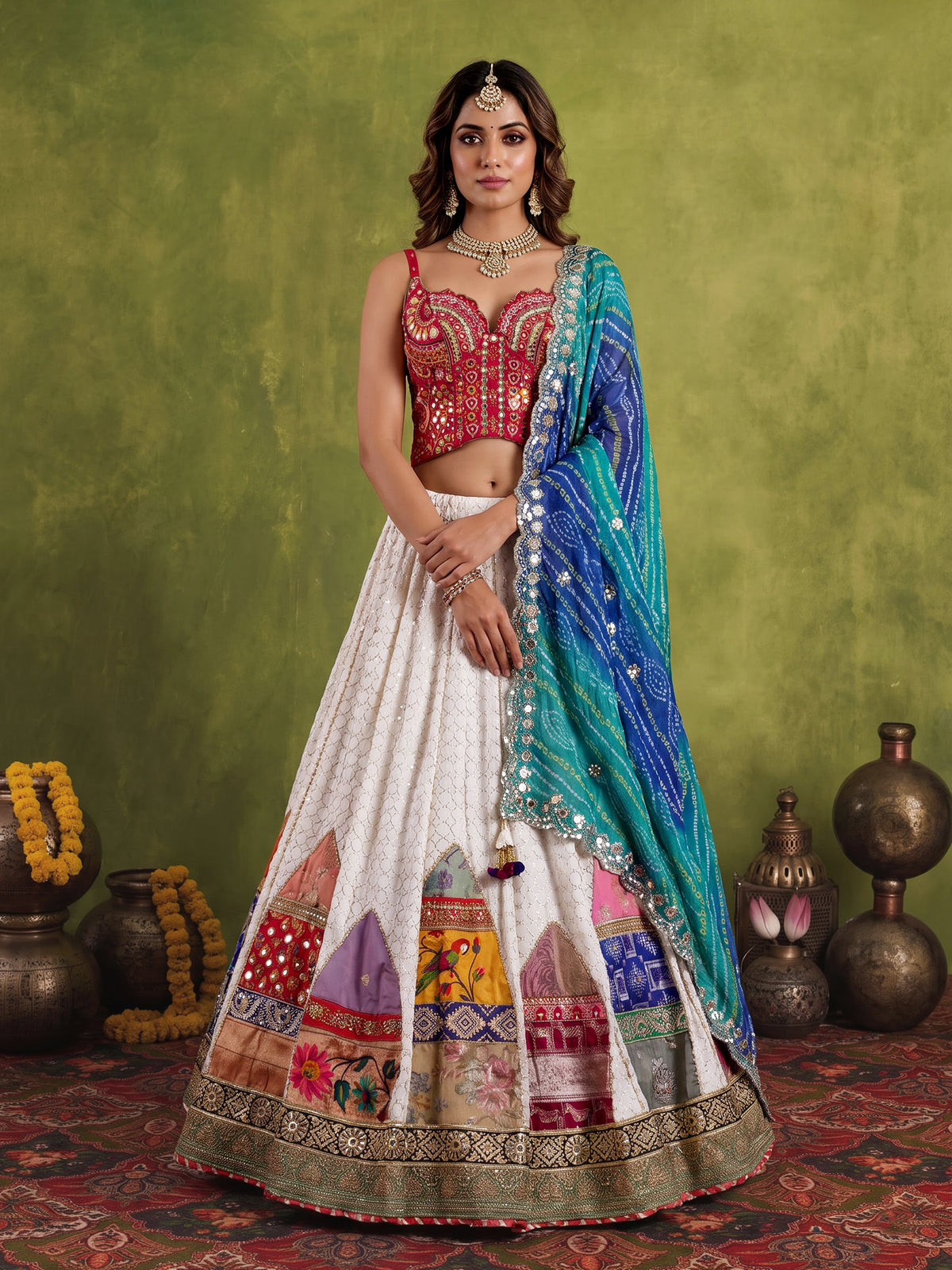 White silk blend lehenga choli with intricate traditional embellishments