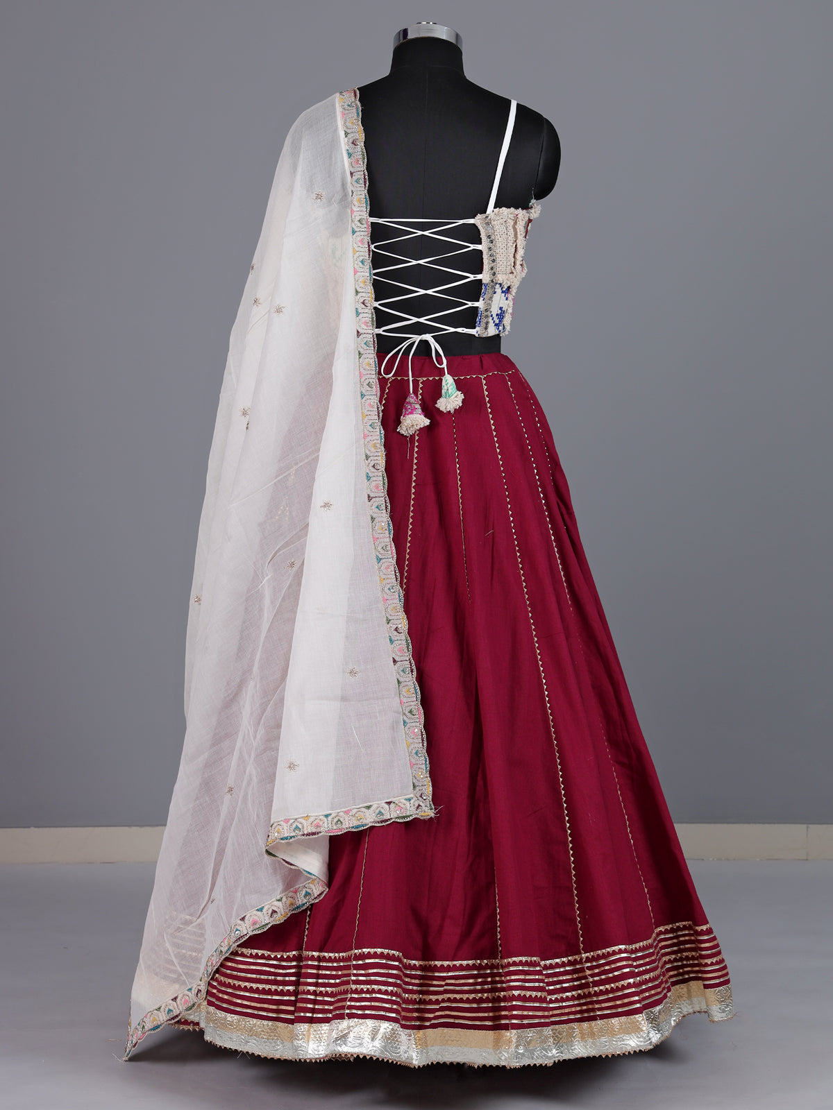 Maroon cotton silk blend lehenga choli with ornate gota embellishments