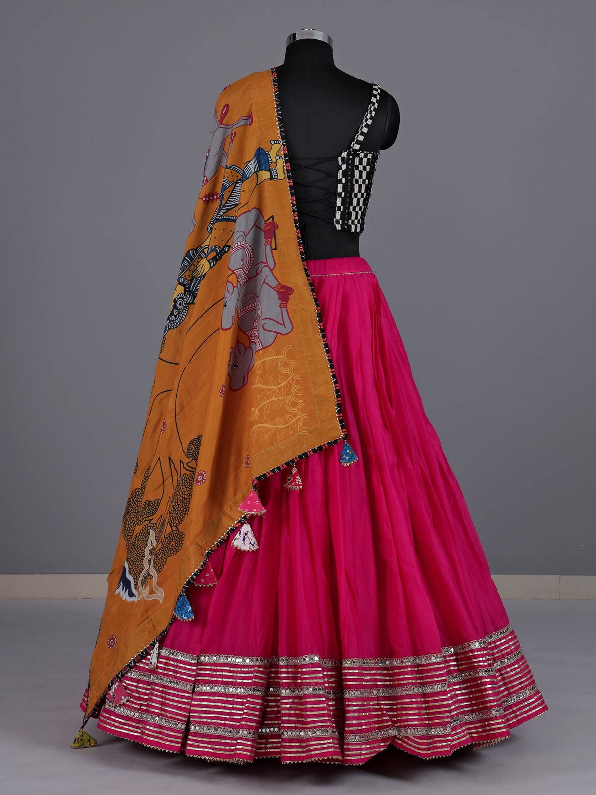 Rani pink pure silk blend lehenga choli with ornate mirror detailing