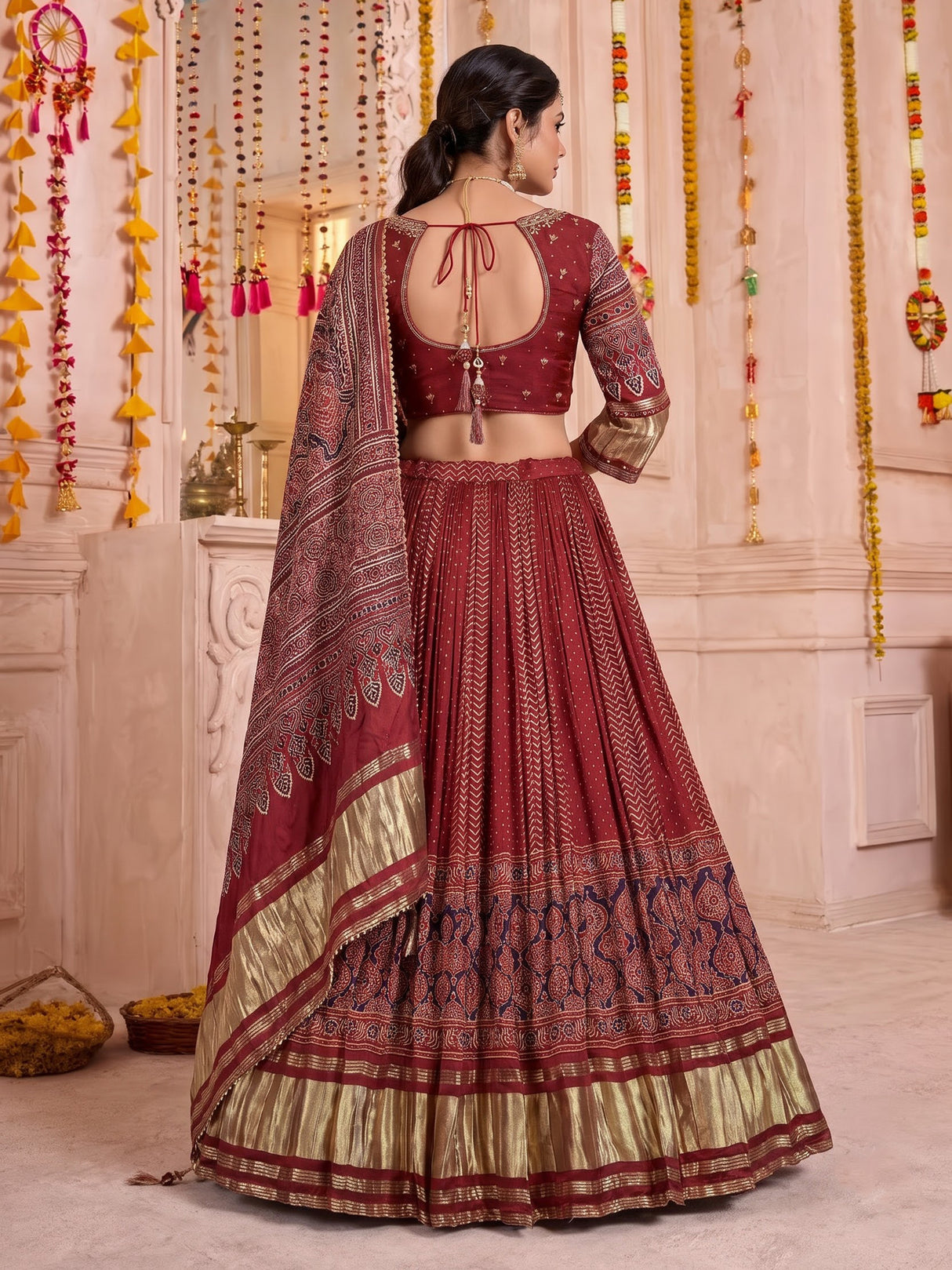Maroon gajji silk lehenga choli with regal festive embellishments