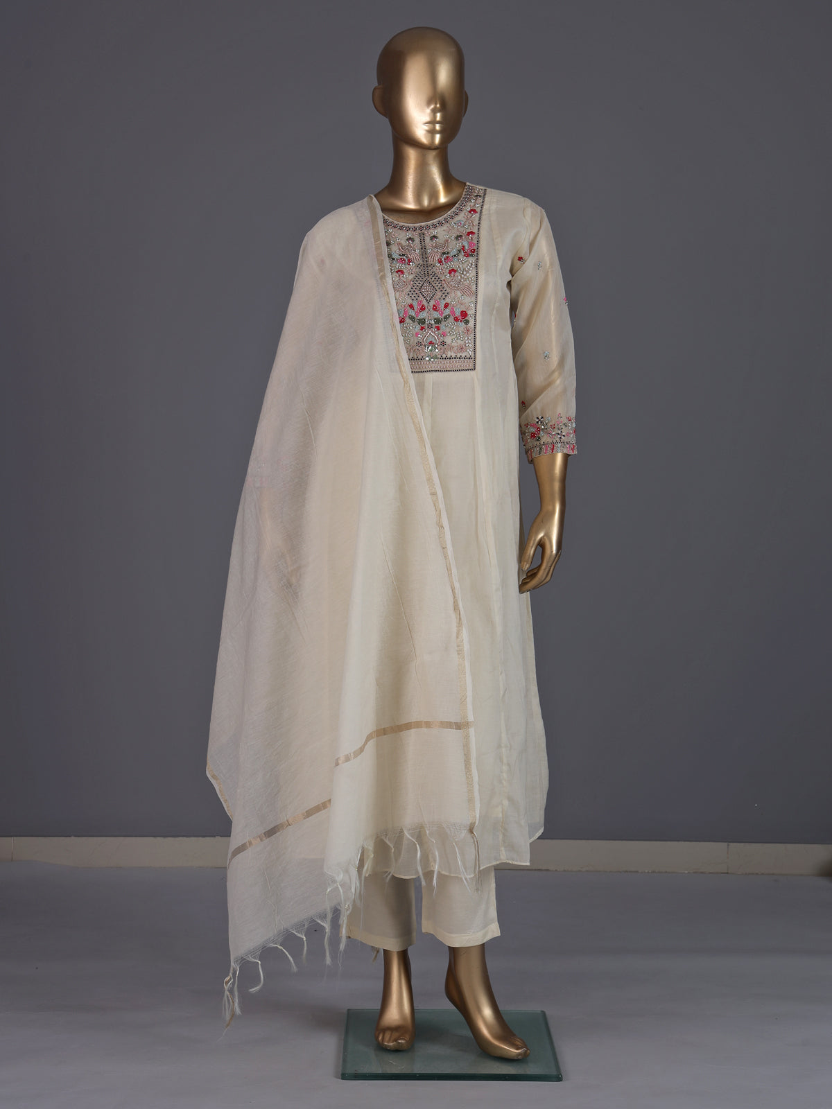 Cream tissue silk salwar suit with elegant yoke detailing