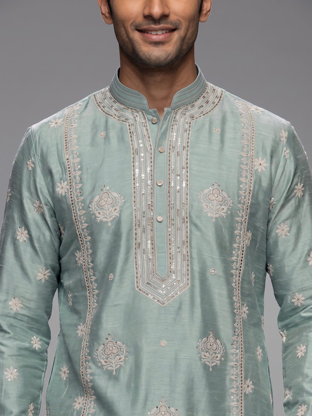 Mint blue raw silk mens kurta suit with graceful butti detailing