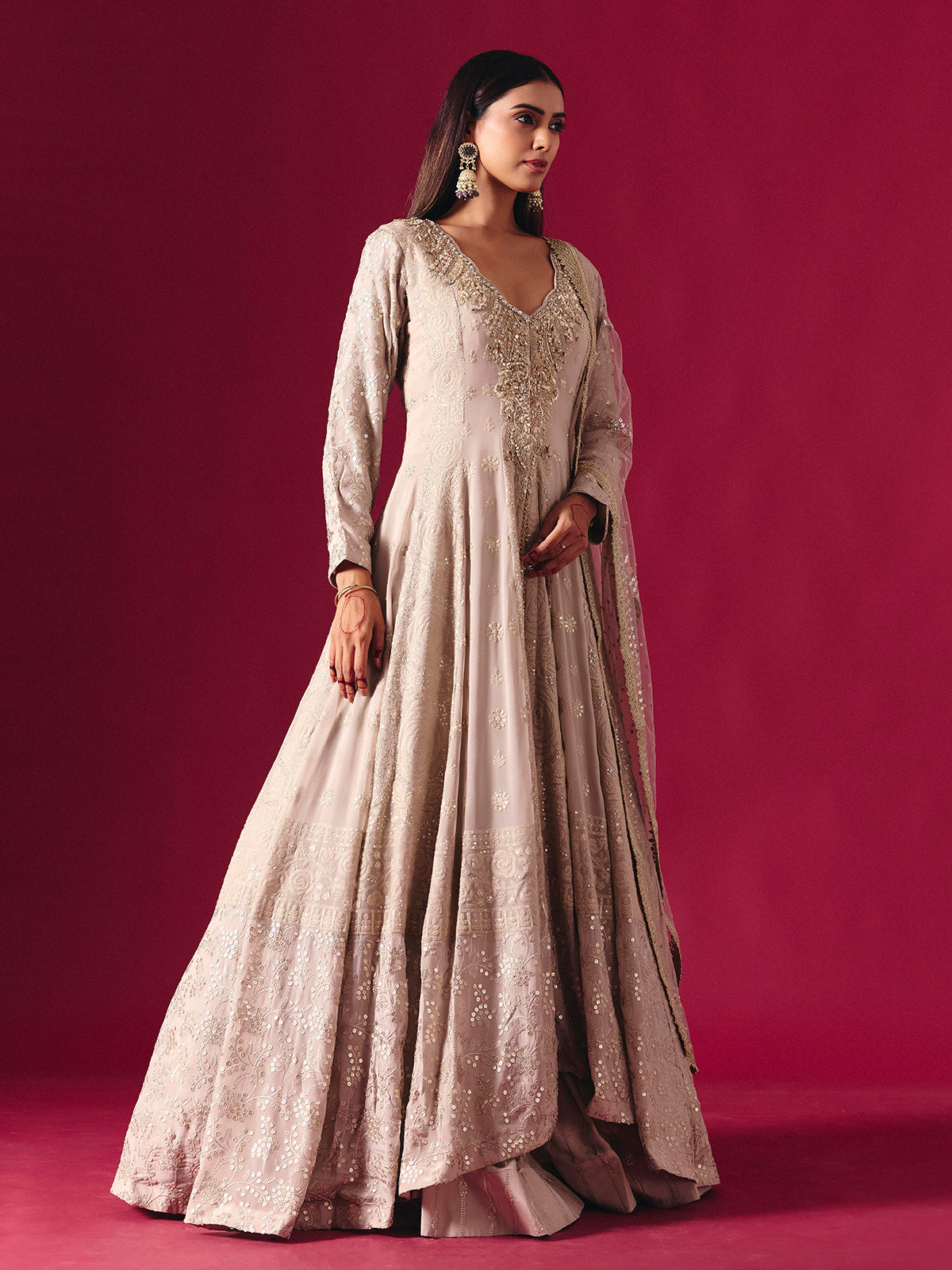 Elegant beige georgette salwar suit with embellished lehenga and dupatta