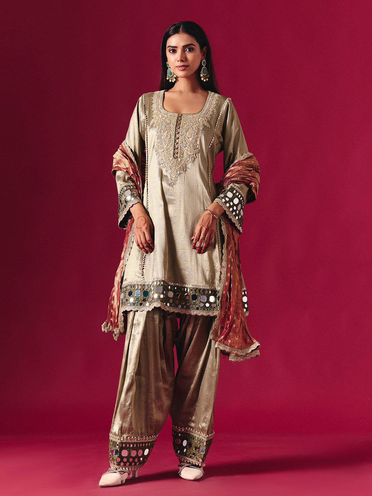 Regal gold silk salwar suit with zardosi embellished dupatta elegance