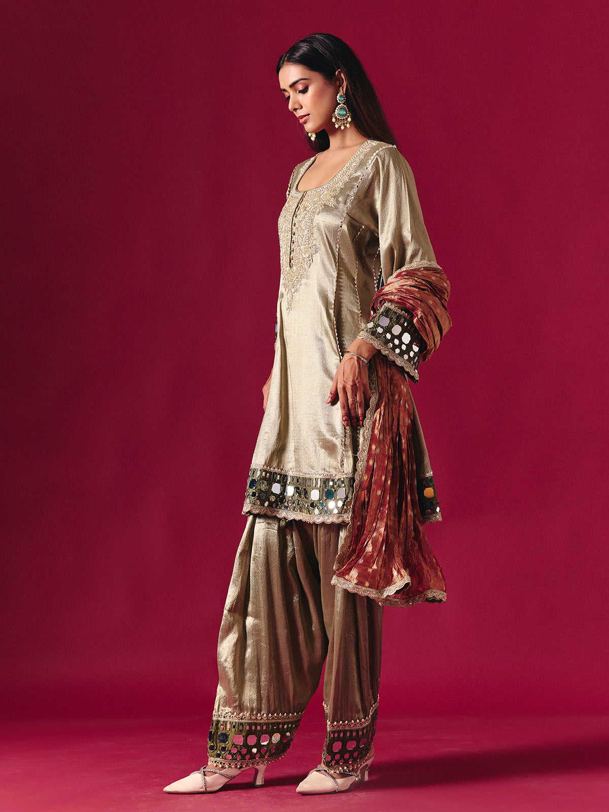 Regal gold silk salwar suit with zardosi embellished dupatta elegance