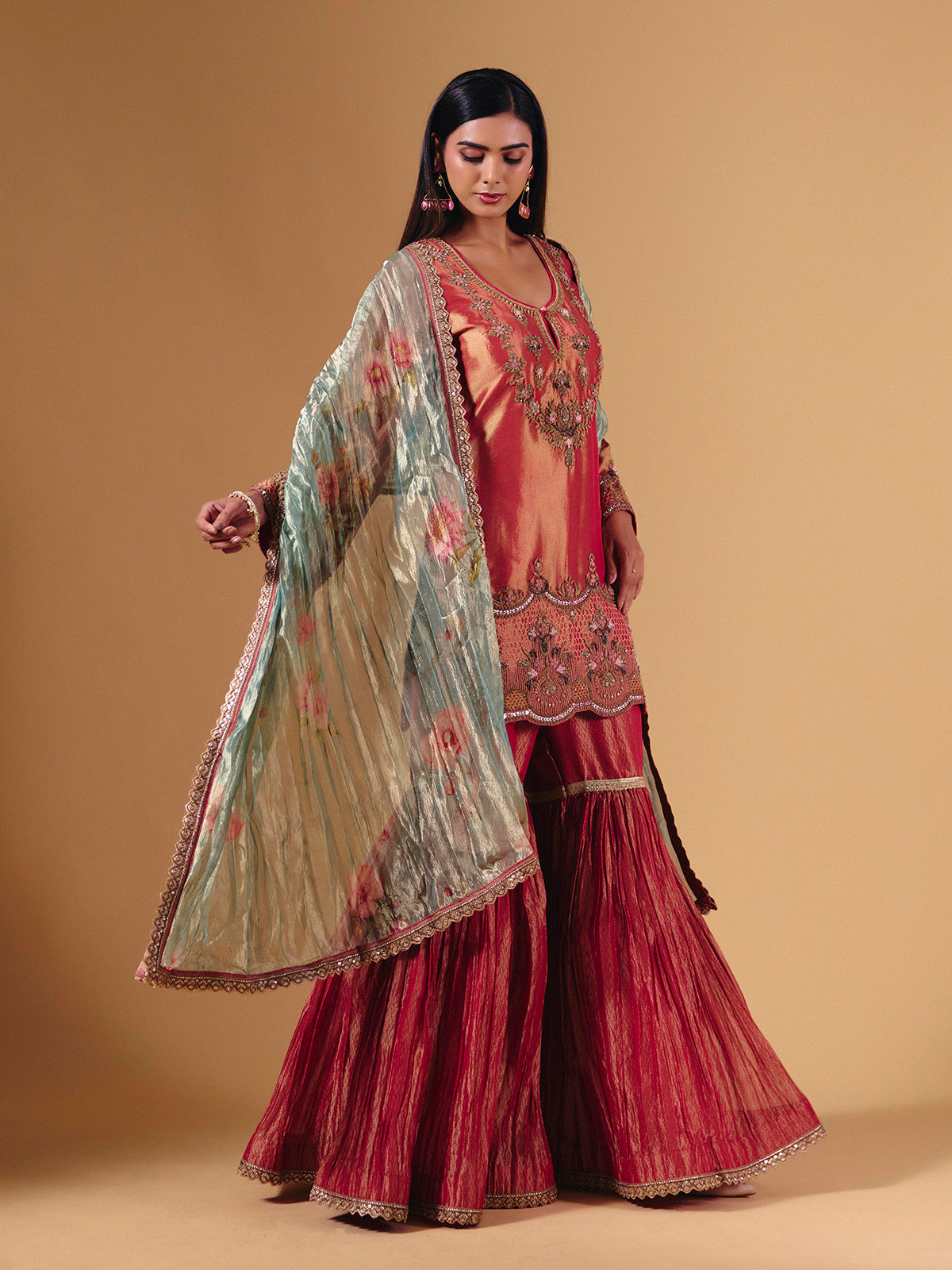 Pastel peach silk sharara suit with cutdana embellishments