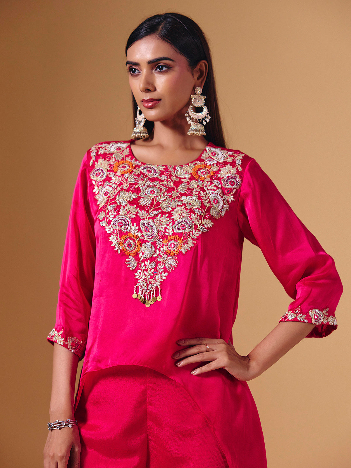 Elegant pink tissue silk palazzo suit with festive embellishments