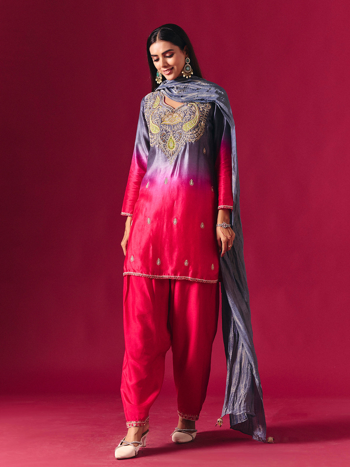 Pretty pink silk shaded salwar suit with purple dupatta detailing