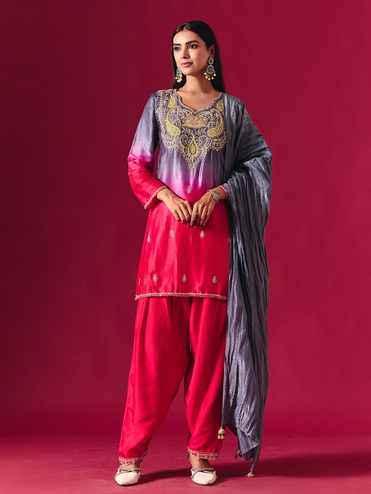 Pretty pink silk shaded salwar suit with purple dupatta detailing