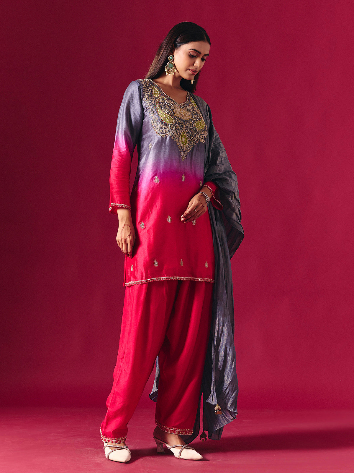 Pretty pink silk shaded salwar suit with purple dupatta detailing