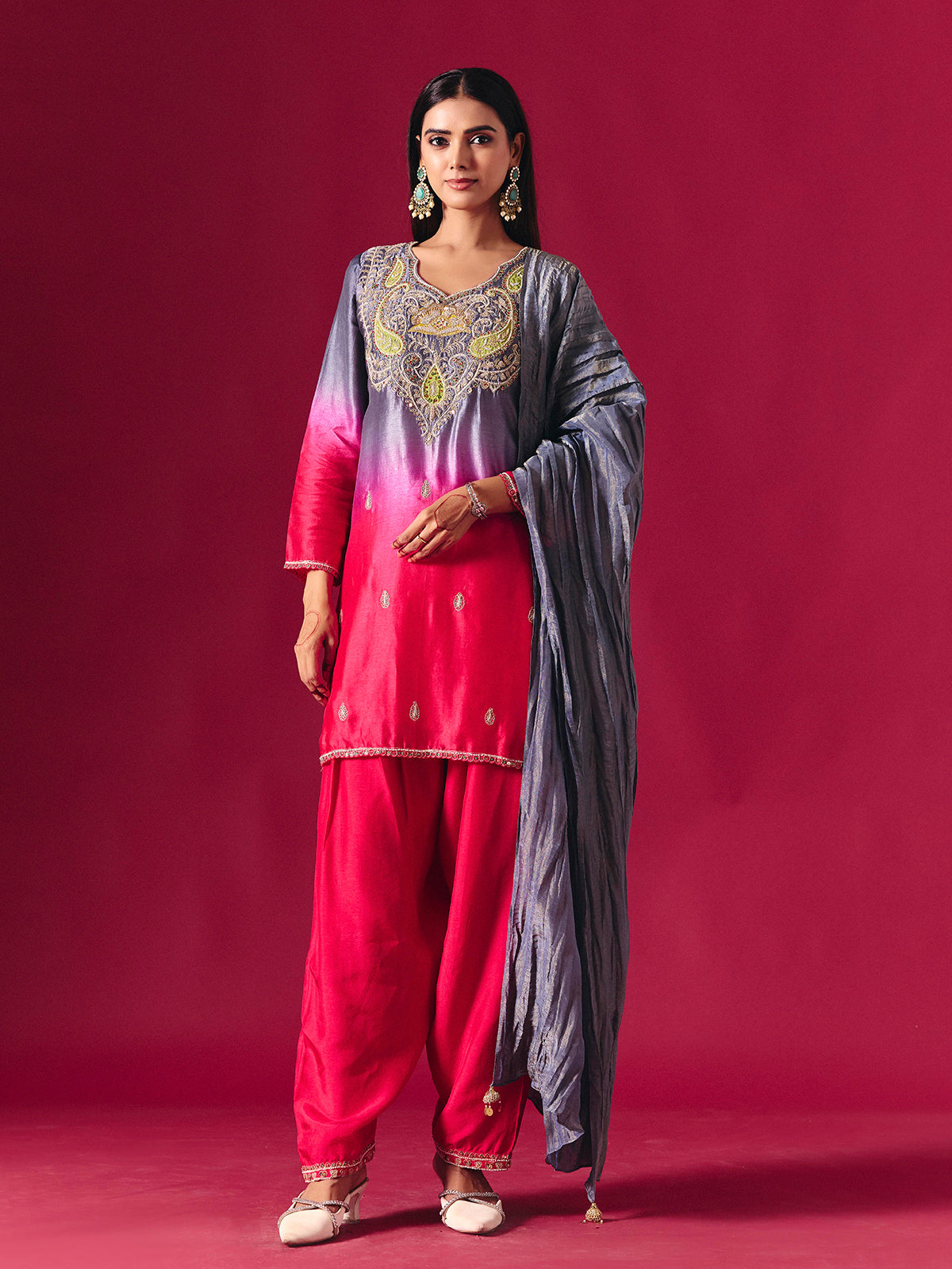 Pretty pink silk shaded salwar suit with purple dupatta detailing